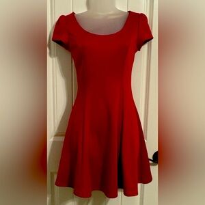 Papaya women’s dress. Never been worn has the dry cleaning tag still attached.